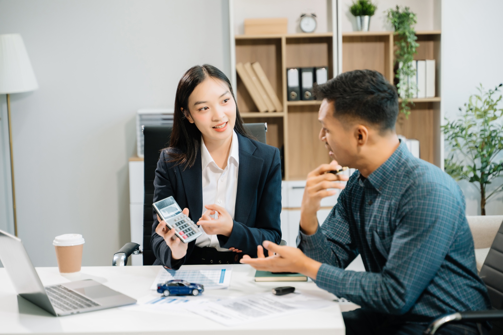Capturing a cheerful business consultation scene with smiling professionals, perfect